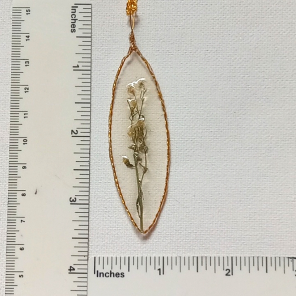 Large floral necklace, amulet